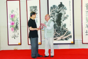 汤立